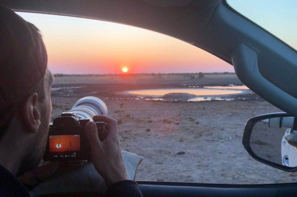 Die Sonne geht auf und wir fotografieren aus dem Auto heraus