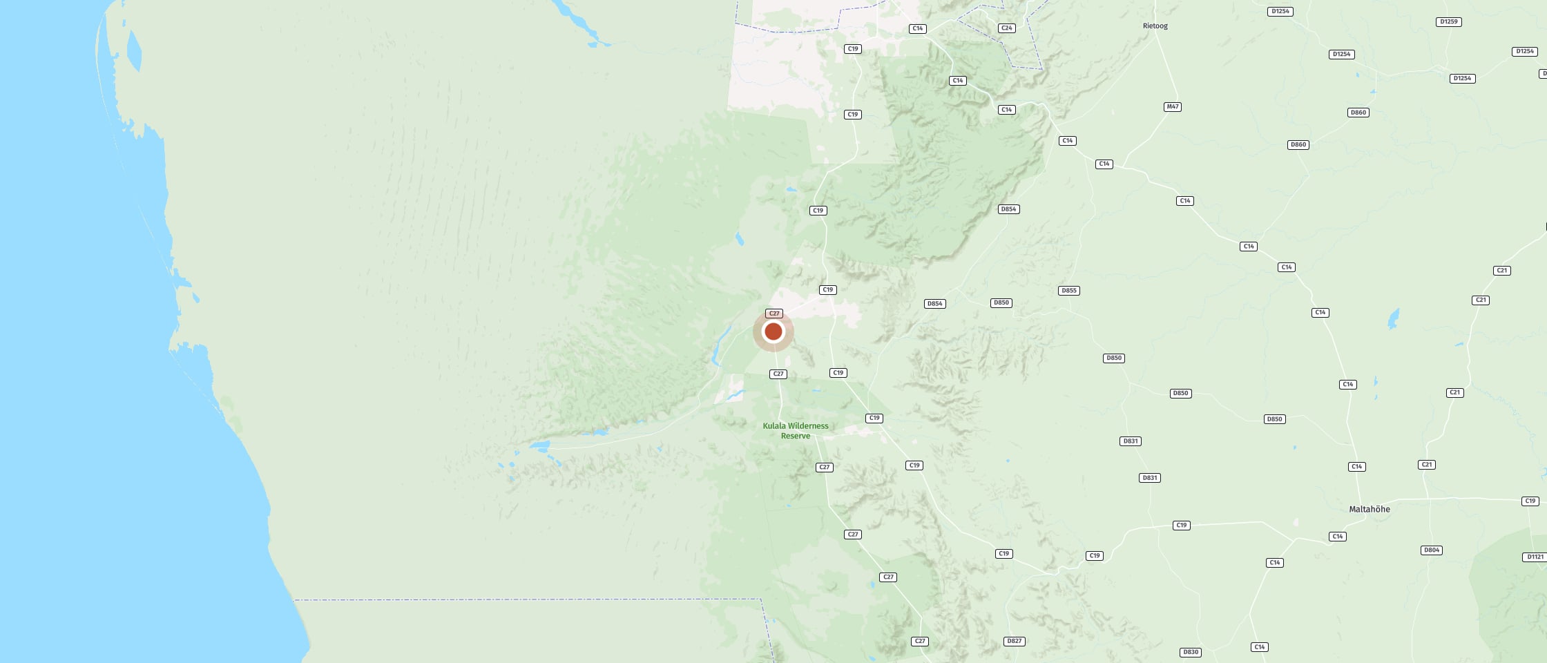 Map: Hike through a dry riverbed surrounded by rock walls