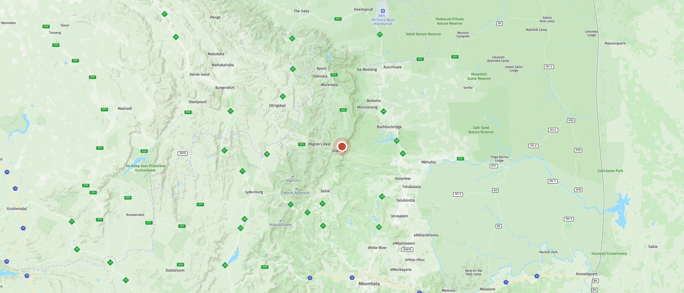 Map: Views of steep Pinnacle Rock in the middle of a green gorge